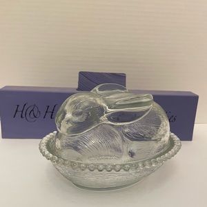 Clear bunny resting on nest